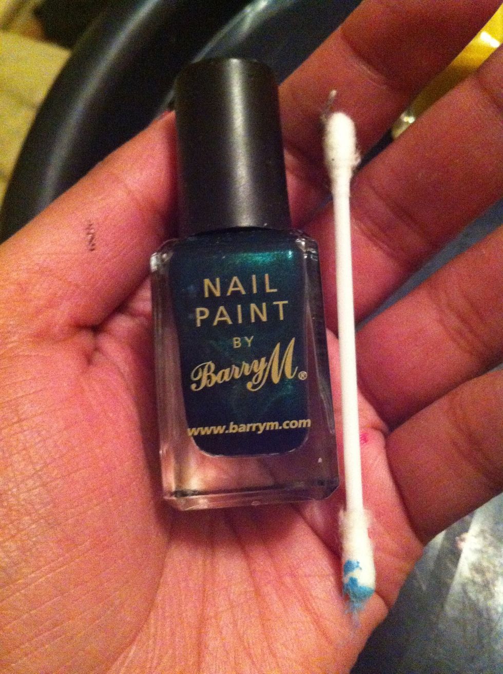 Now get your dark green or blue, dab along the edges of your line to blend it in with the black base