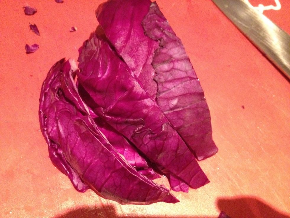 Now get your hunk of cabbage and cut it into thirds, lengthwise