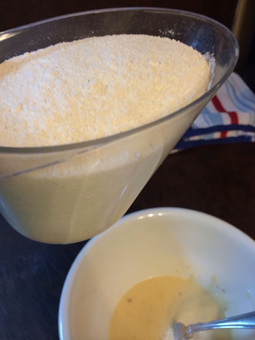 Now get your self rising corn meal. Measure and add 2 cups.