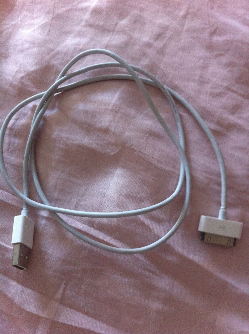 Now get your USB to iPhone or iPad iTouch connector.