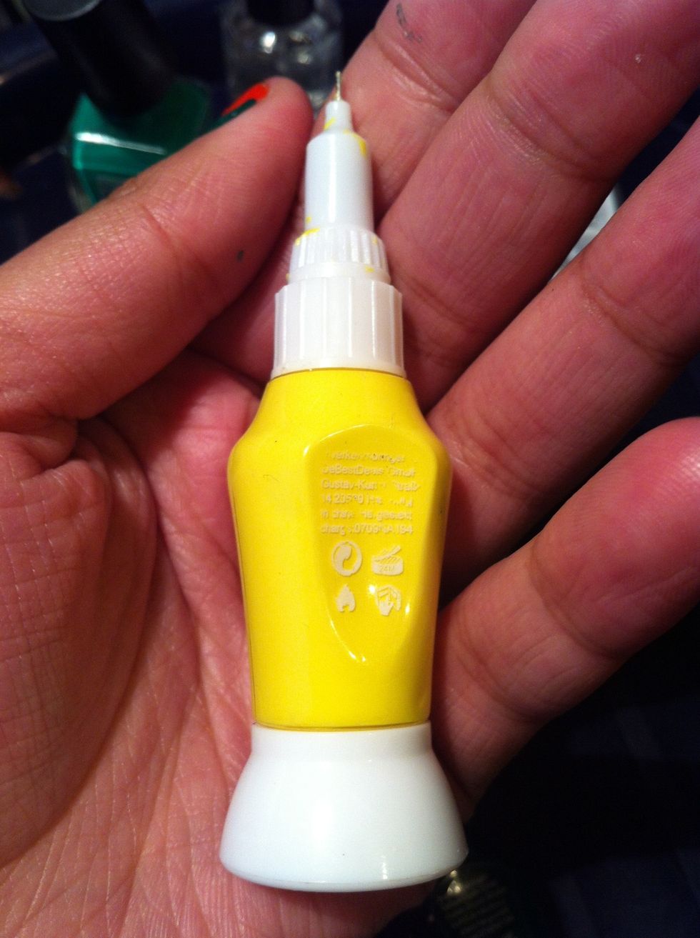 Now get your yellow nail art pen