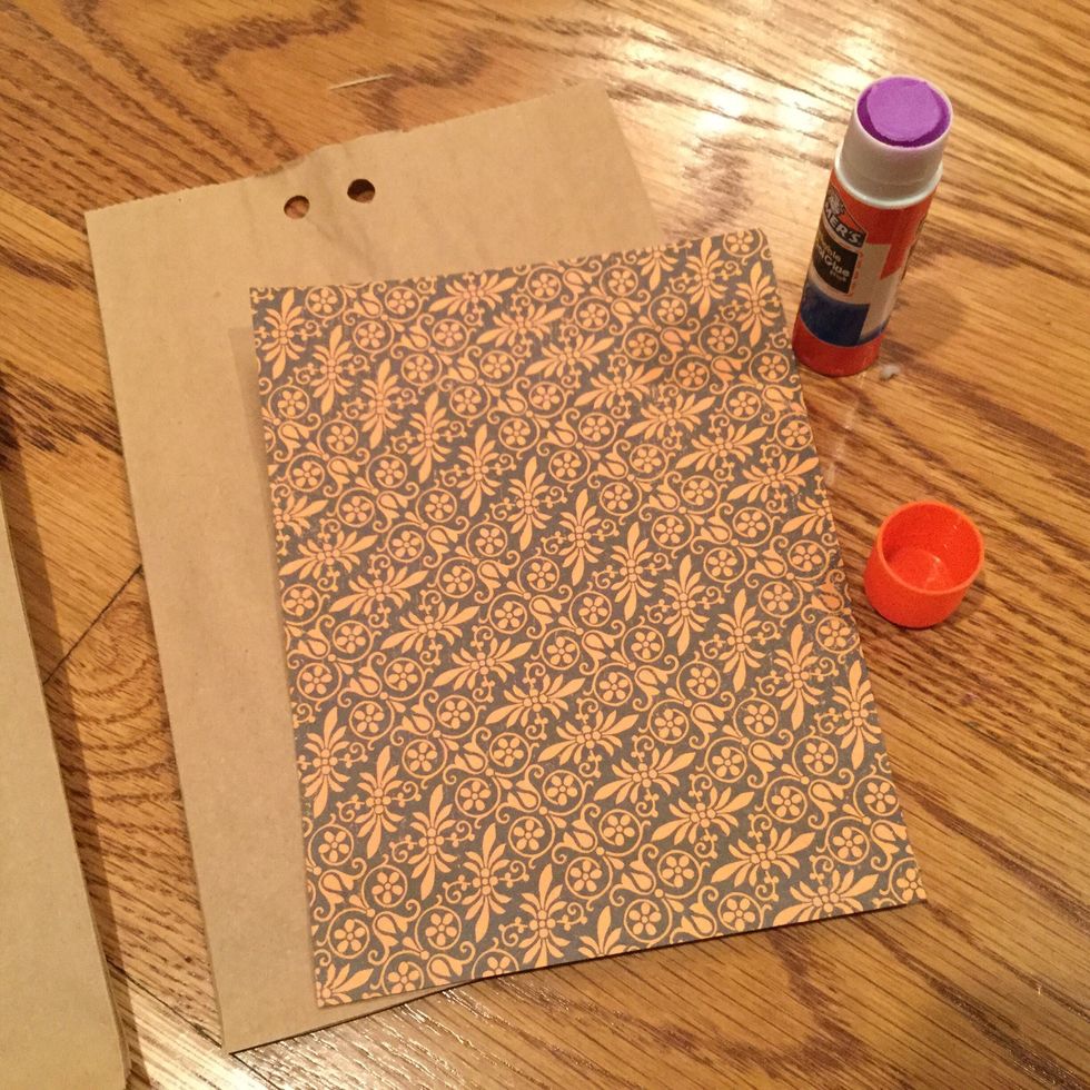 Now, glue your scrapbook paper to your bags.