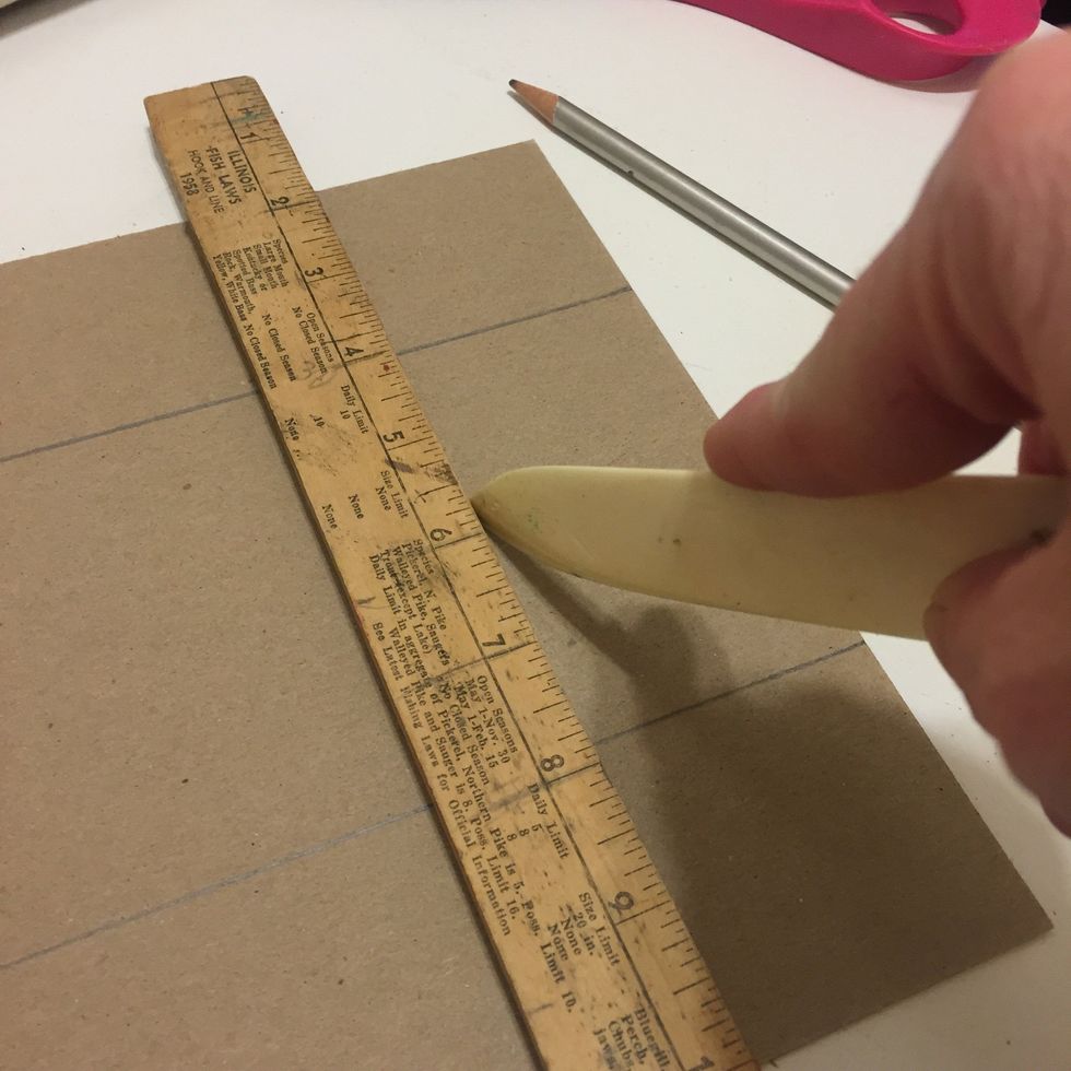 Now go over your lines with a bone folder, or the smooth edge of a butter knife- press HARD