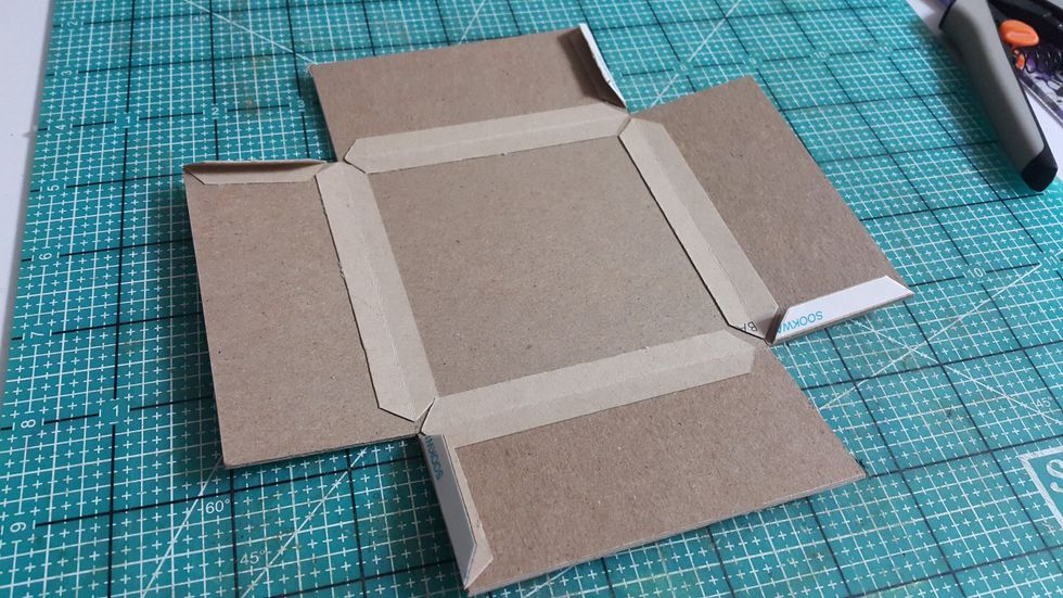 Now go to the last hole, ready chipboard pieces of 3-5/8"x3-5/8"(1pc) and 1-1/2"x3-5/8"(4pcs), use connecting strips to form it to shape