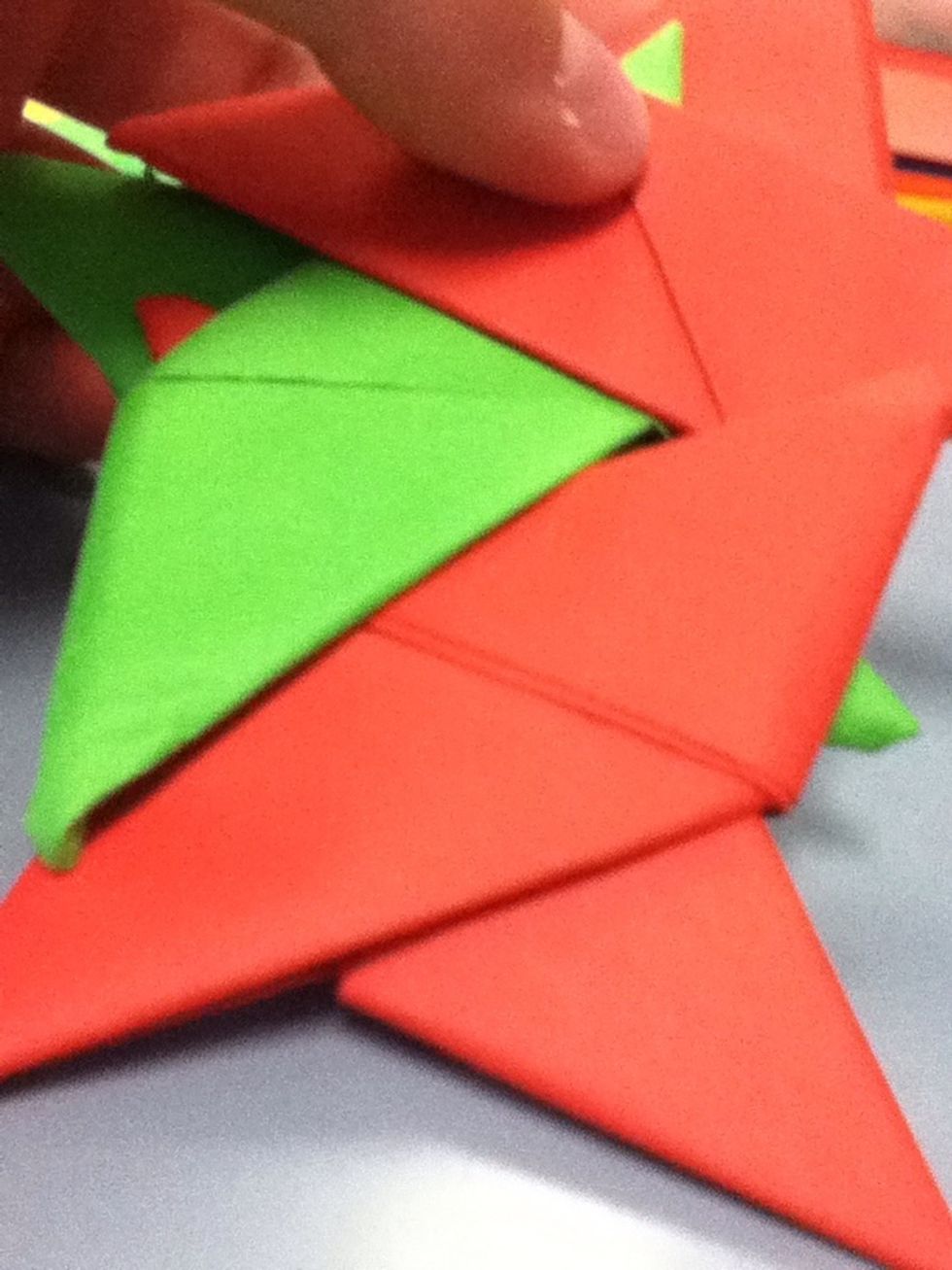 Now grab another star and tuck the corner of it in the back of the other star