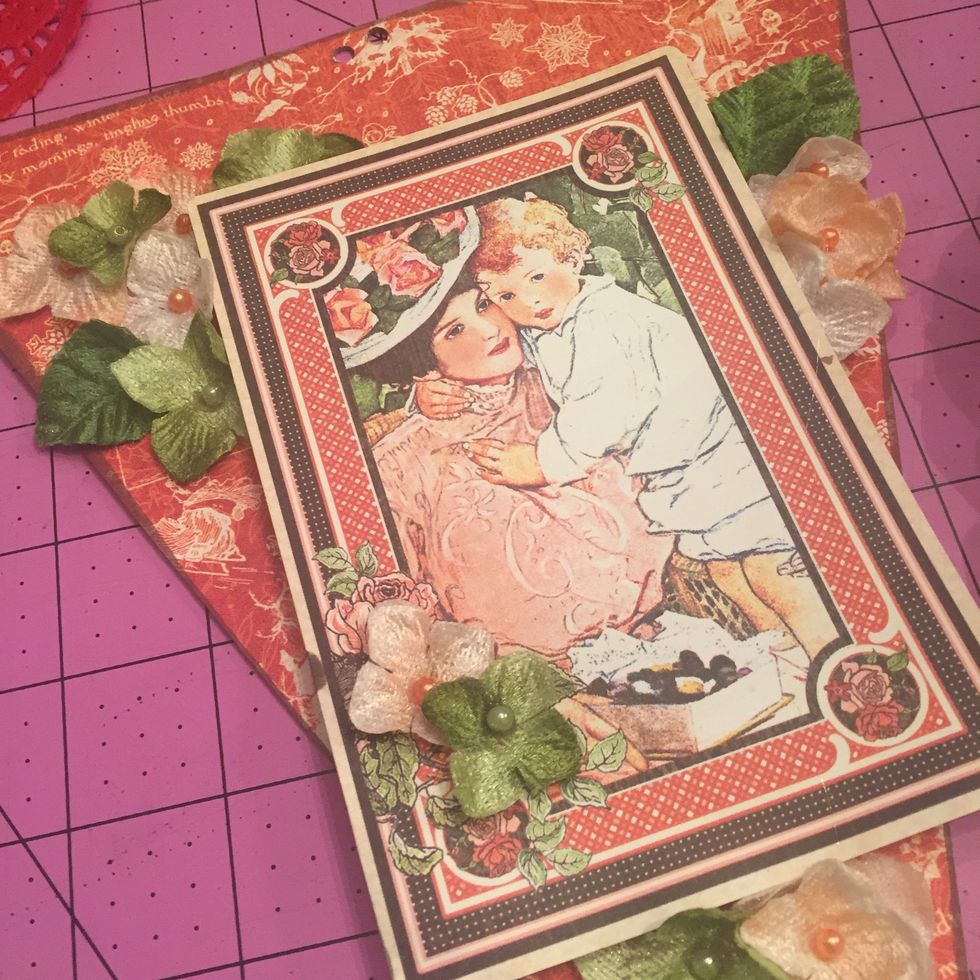 Now grab that Graphic 45 Paper, Petaloo Flowers and hot glue gun and go for it! I design in this order- Focal Piece, large flowers first, leaves, then small flowers and layers