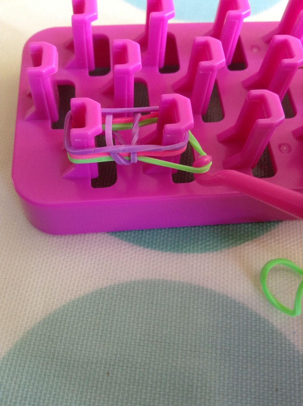 Now grab the bottom band and do the same as wig the last purple...