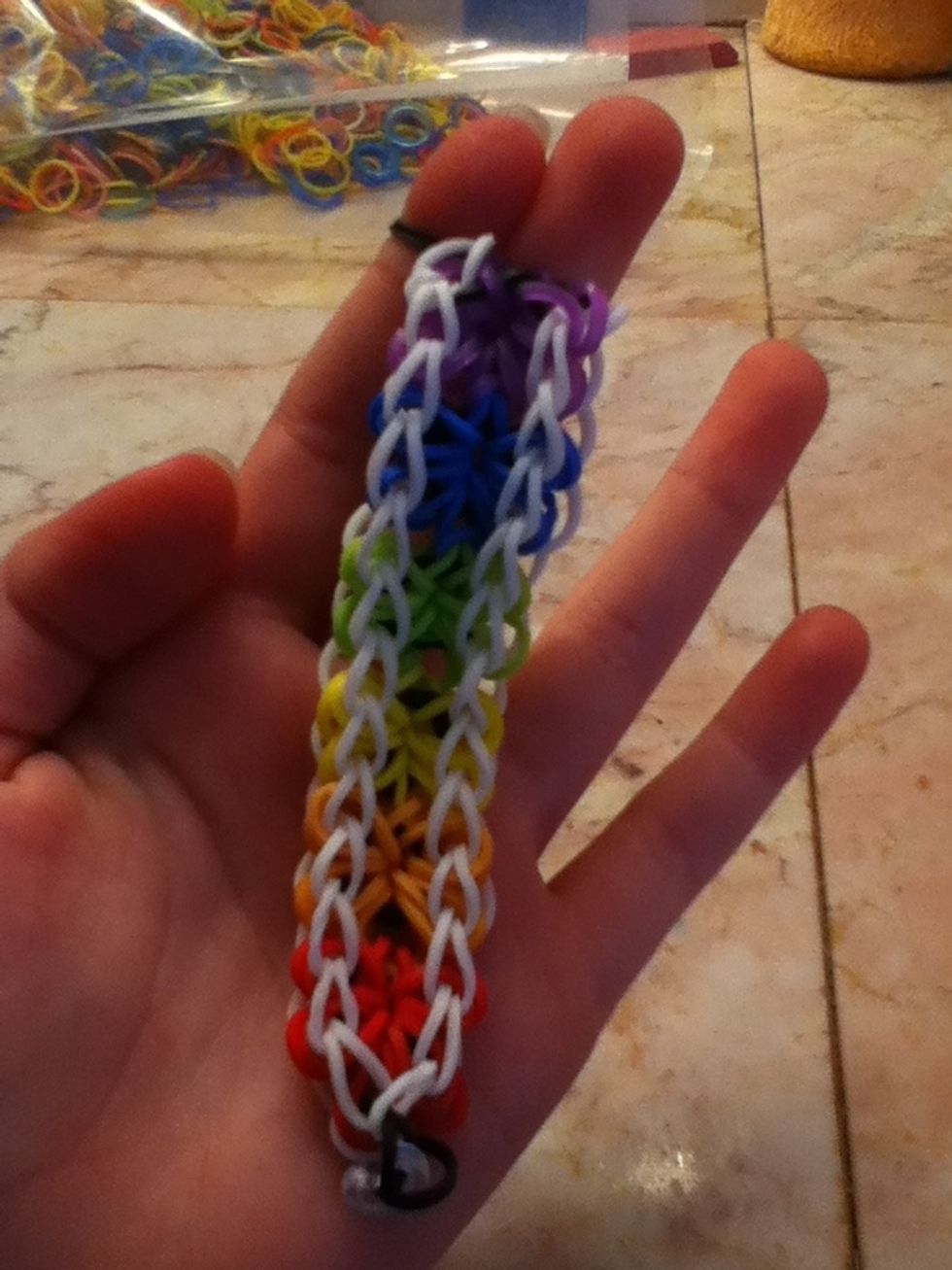 Now grab the opposite side. Put two fingers through.