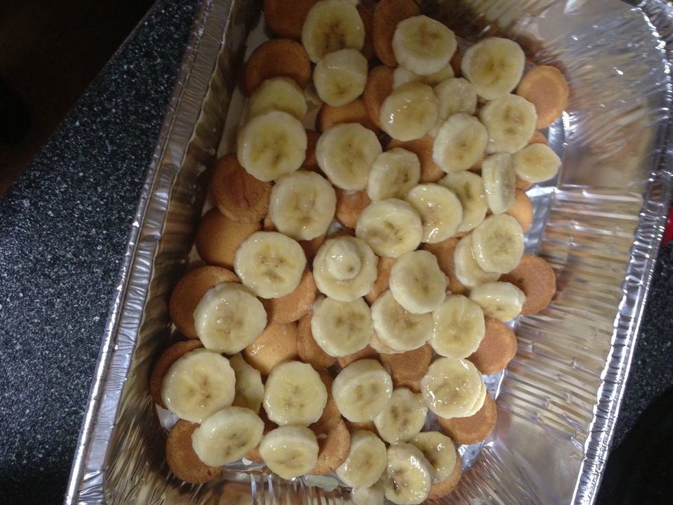 Now grab those pineapple infused bananas & layer half of them on top of wafers. Notice the bananas haven't browned the whole time they were waiting their turn!