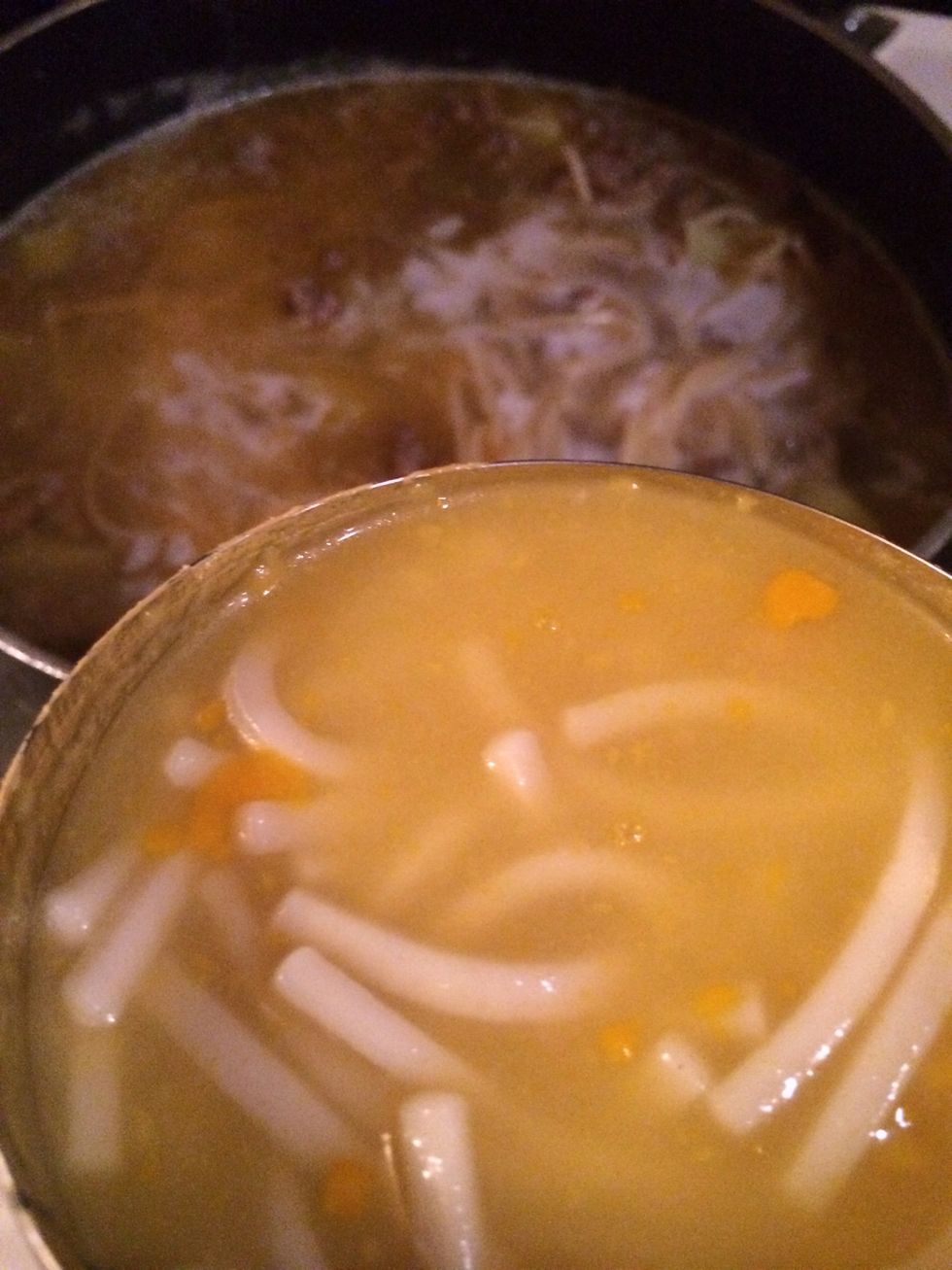 now grab your Campbell's chicken soup, and pour that into the same pot that has the cooked potatoes and Spaghetti\ud83d\udc49