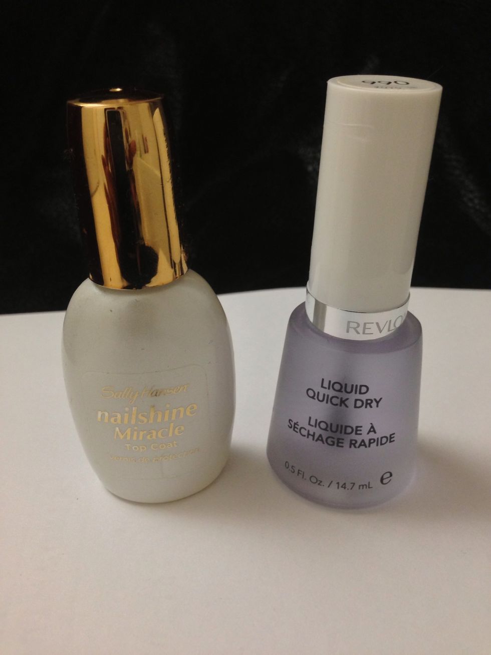 Now grab your top coat. I'm using Sally Hansen's Miracle Shine. I am also going to use Revlon's Liquid Quick Dry to speed things along.