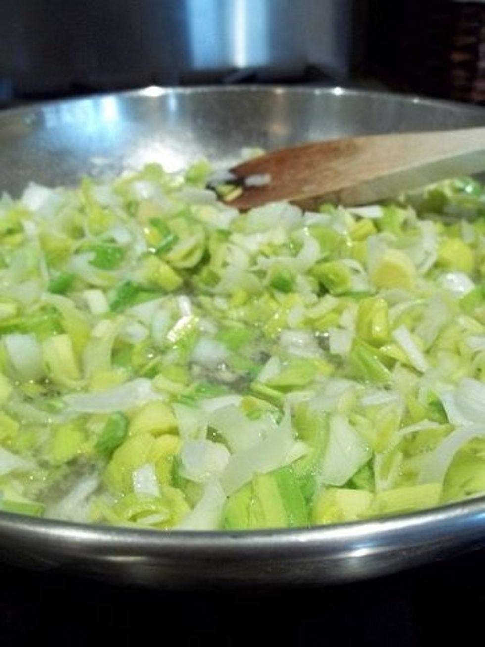 Now heat the butter in a large skillet over medium-high heat. Add the leeks and saut\u00e9 for 2-3 minutes, until the leeks are softened.