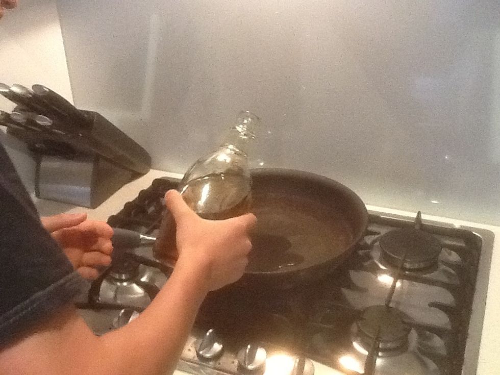 Now heat up the stove and place some oil into a pan