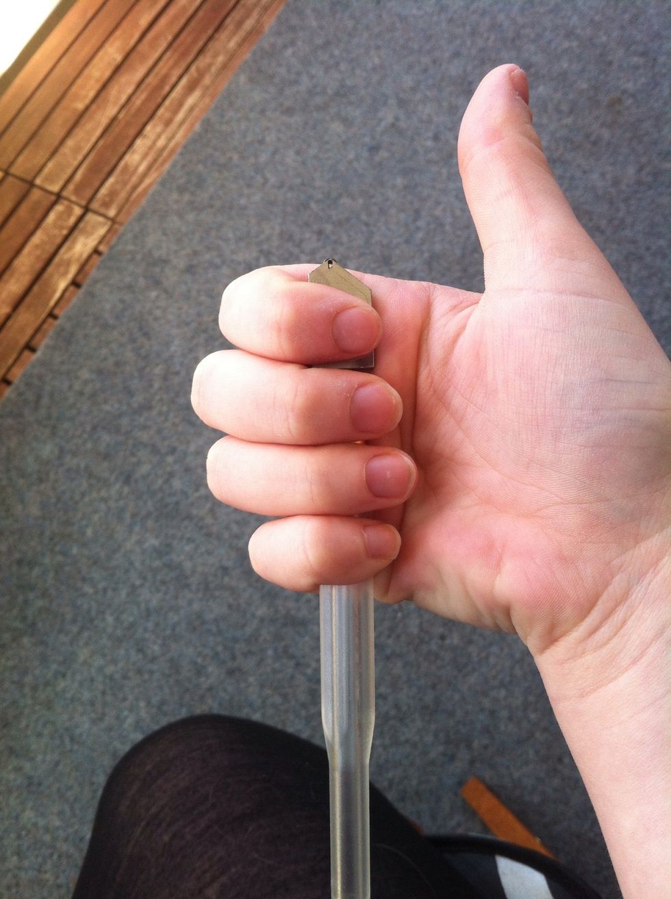 Now hold your glasscutter like this