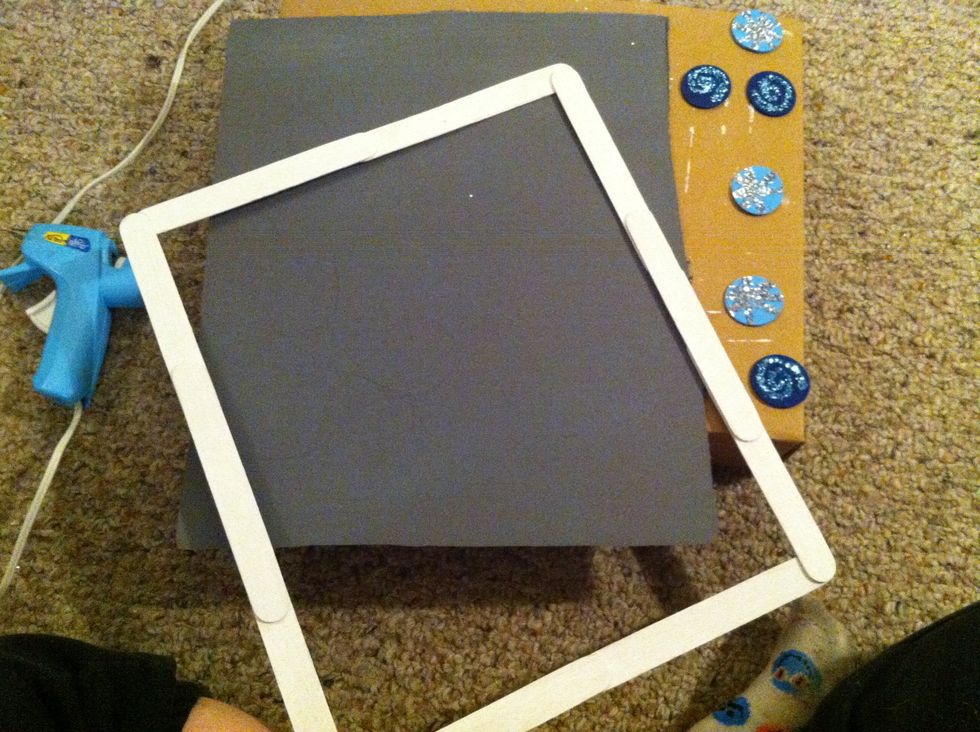 Now hot glue all four sides together to make a frame.