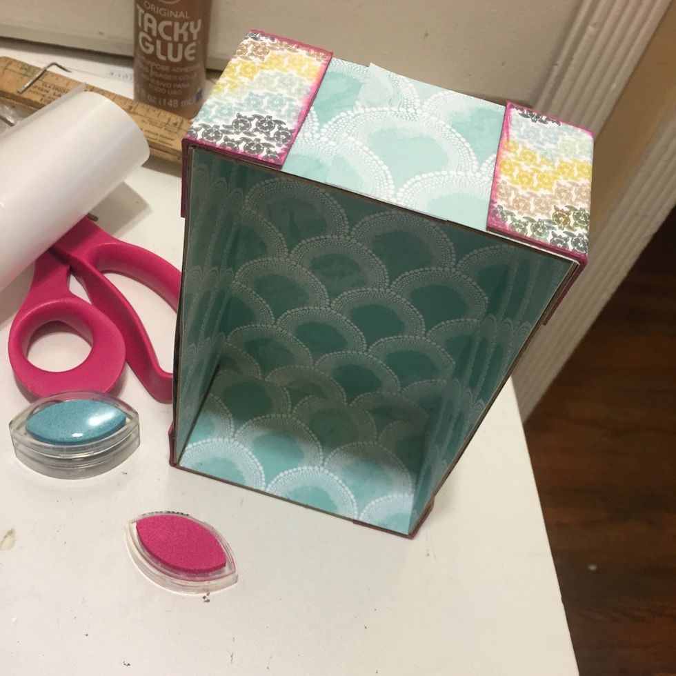 Now hot glue those babies on to sturdy your box! Now the fun part!!Decorate away! I used a paper kit collection from Authentique and Petaloo Flowers