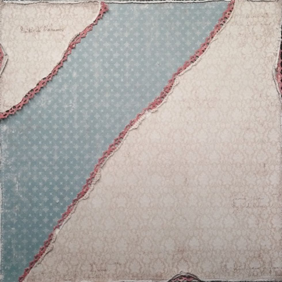 Now I cut out a whole bunch of the same border dies to place underneath my lighter sheet of patterned paper.