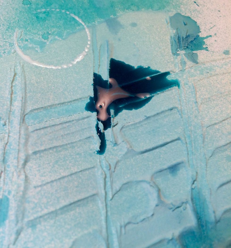 Now, I drip some Panache Minx Shimmering Inks onto the dried and sprayed Mud Texture Medium.