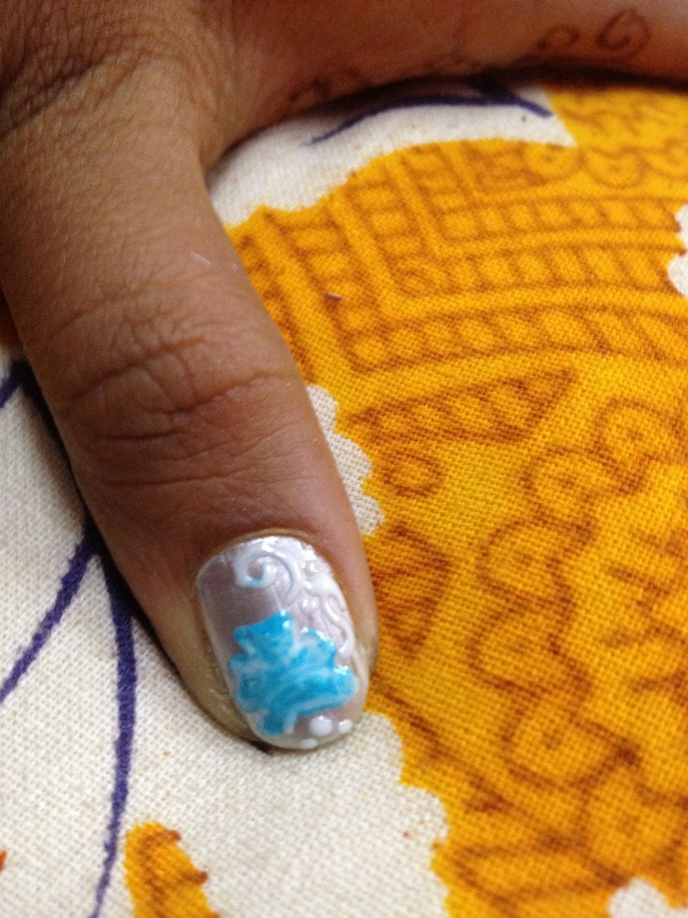 Now I just mixed a blob of white and a blob of blue on an uneven but still kinda round shape