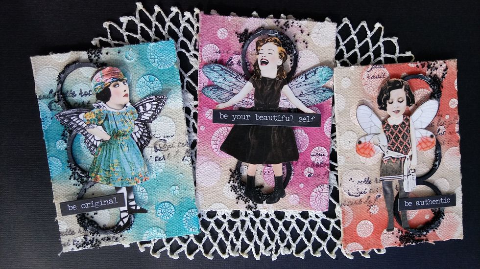 Now, I'll glue my little dolls on and have three adorable little ATC's ready to be traded!