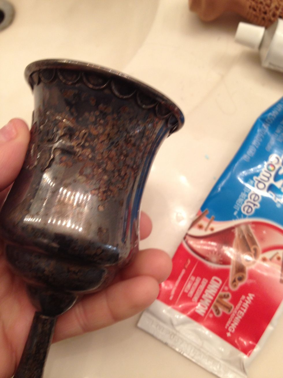 Now I'm going to clean a silver cup.