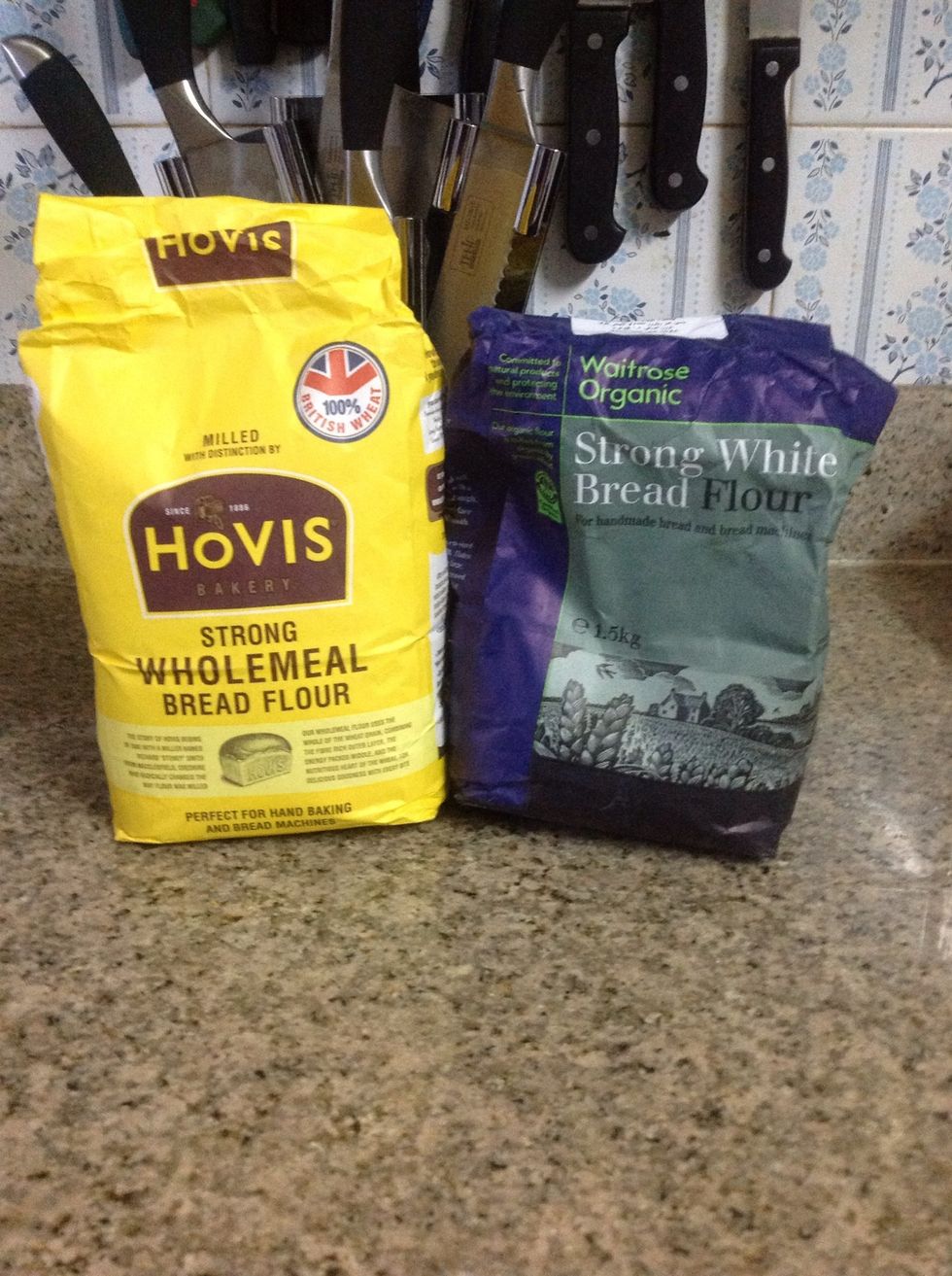 Now I'm using 1 1/2 cups each of wholemeal bread flour and white bread flour for a little fibre and nutty flavor, but you could easily use all white flour.