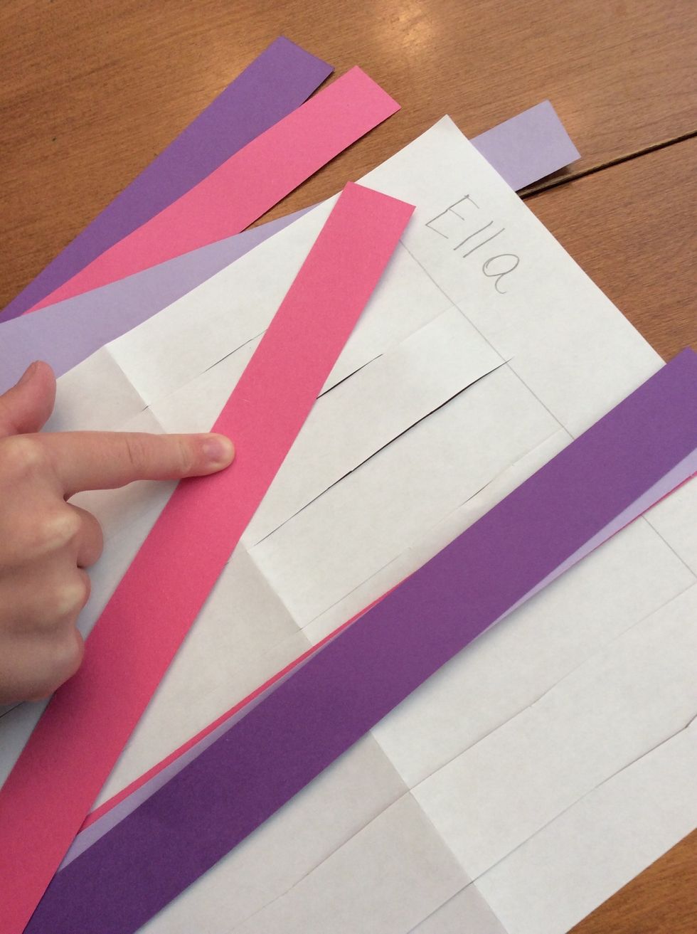 Now I need some paper strips to weave with. The strips are the WEFT in my weaving.