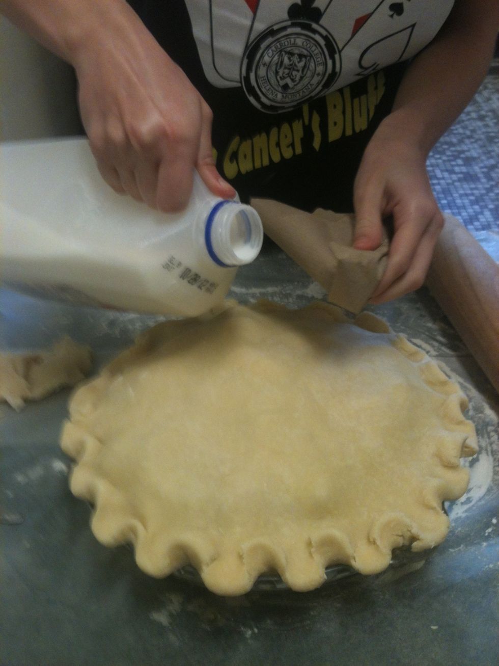 Now I pour milk on the crust and then put sugar on top. The milk helps the sugar stick :)