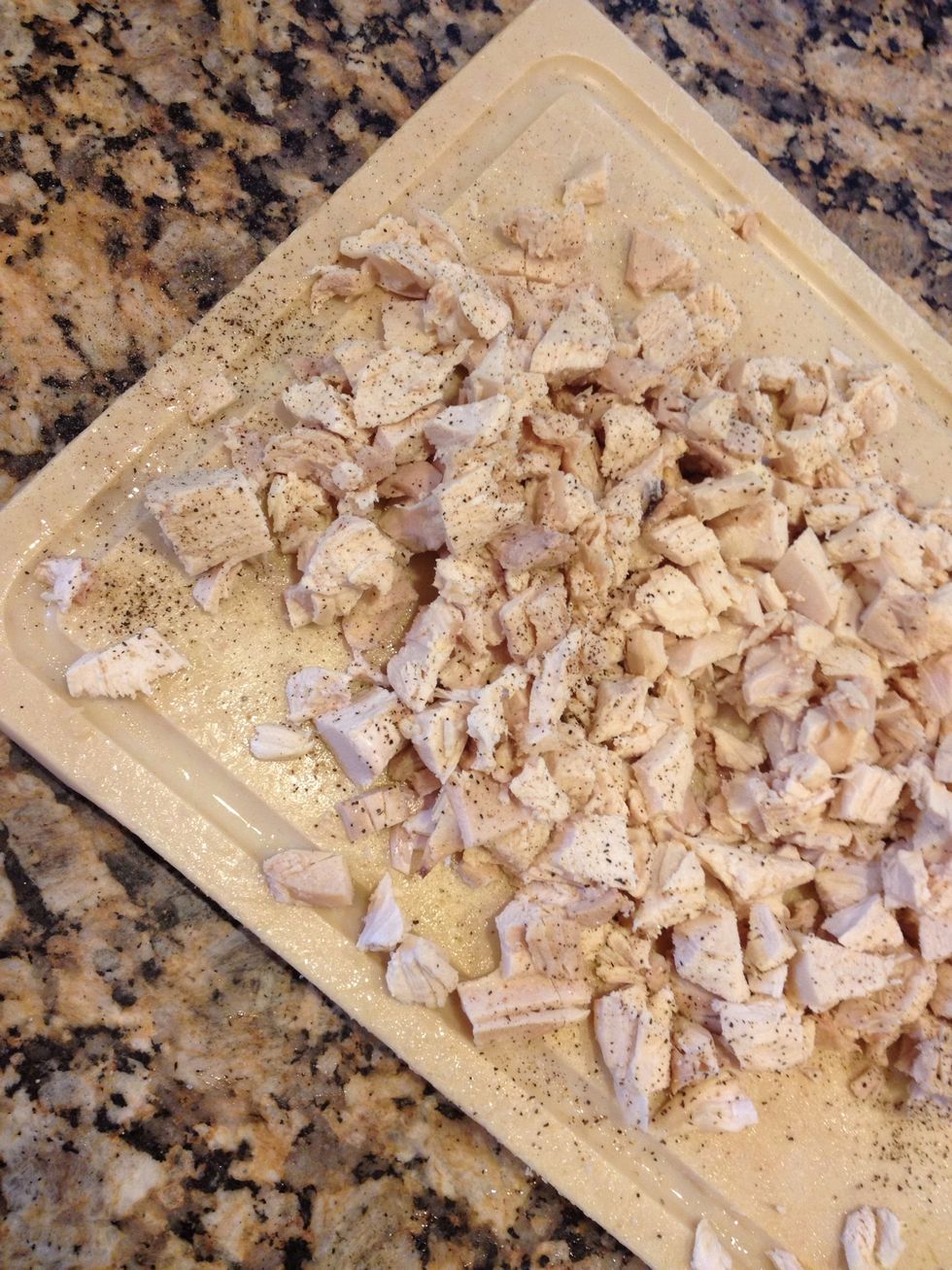 Now I season the chicken w salt and pepper. Add this to the simmering stock and veggies while it cooks for the 10-15 min.