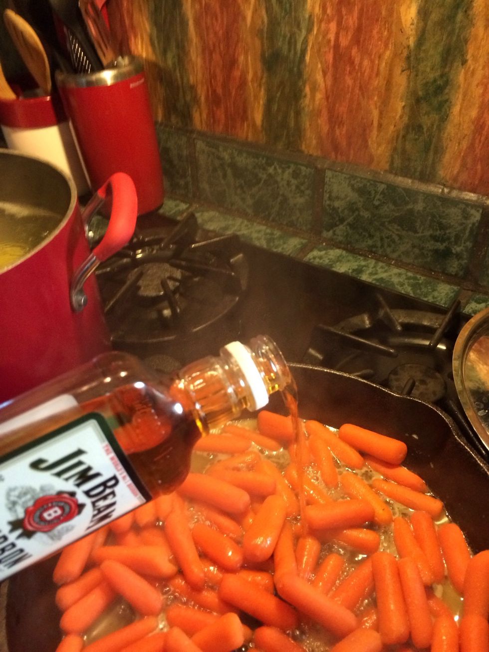 Now I spill an extra couple of ounces of Jim Beam to the pan, and drink the other double shot.