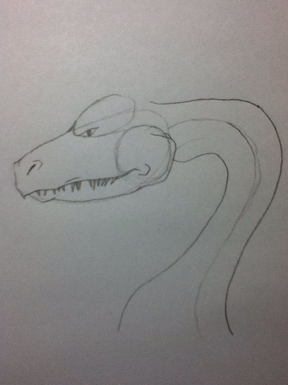 Now I start going in for more details. I gave the eye a pupil and sink it farther into the head. I added an extra flap of skin around the nose and the end of the mouth to give it a 3-dimensional look.