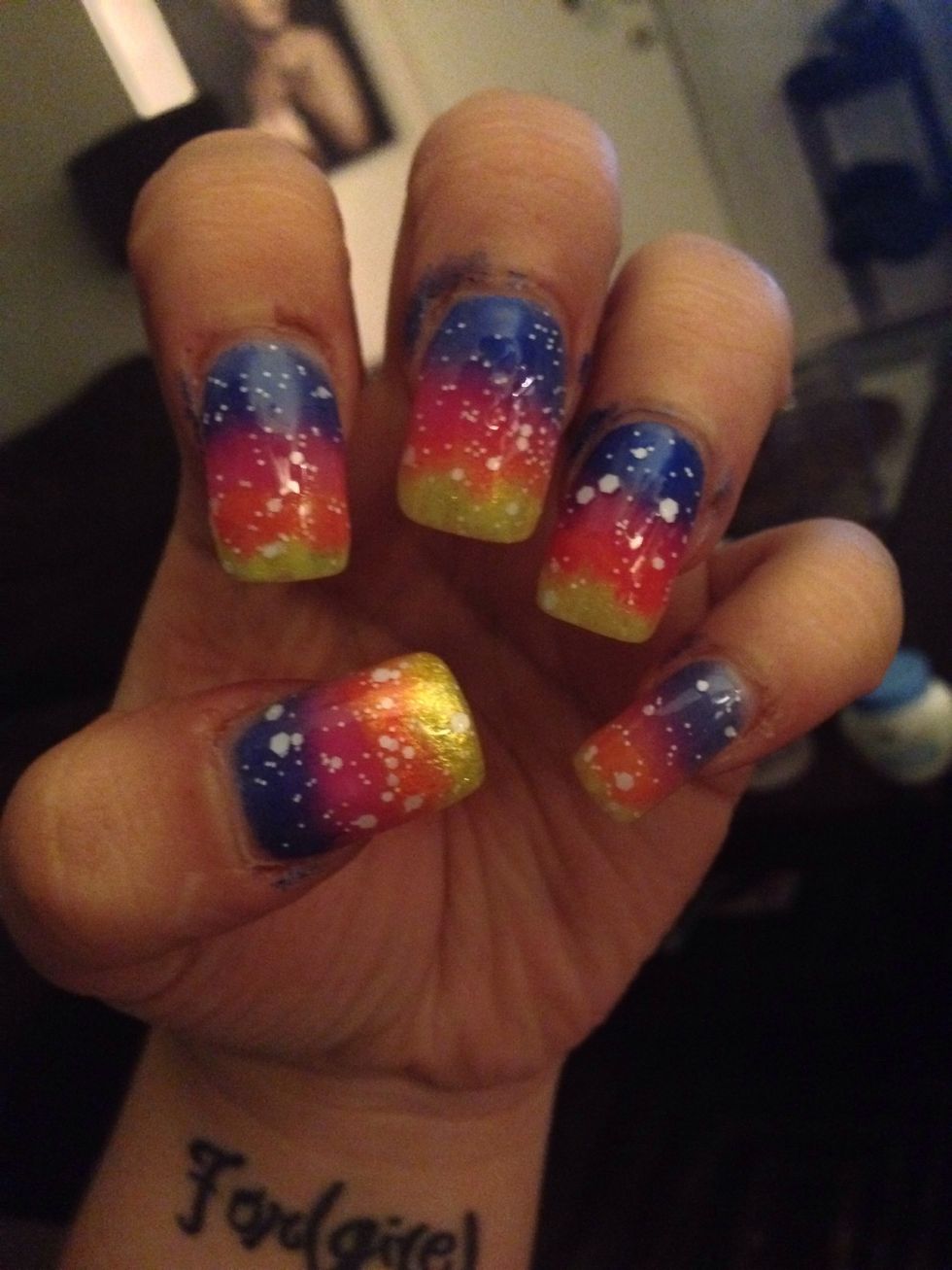 Now I used white glitter. It's by KleanColor the name is I do; Romeo. It's a matte white glitter. Or you can use a toothpick and dip it into white polish and add white dots throughout the nail.