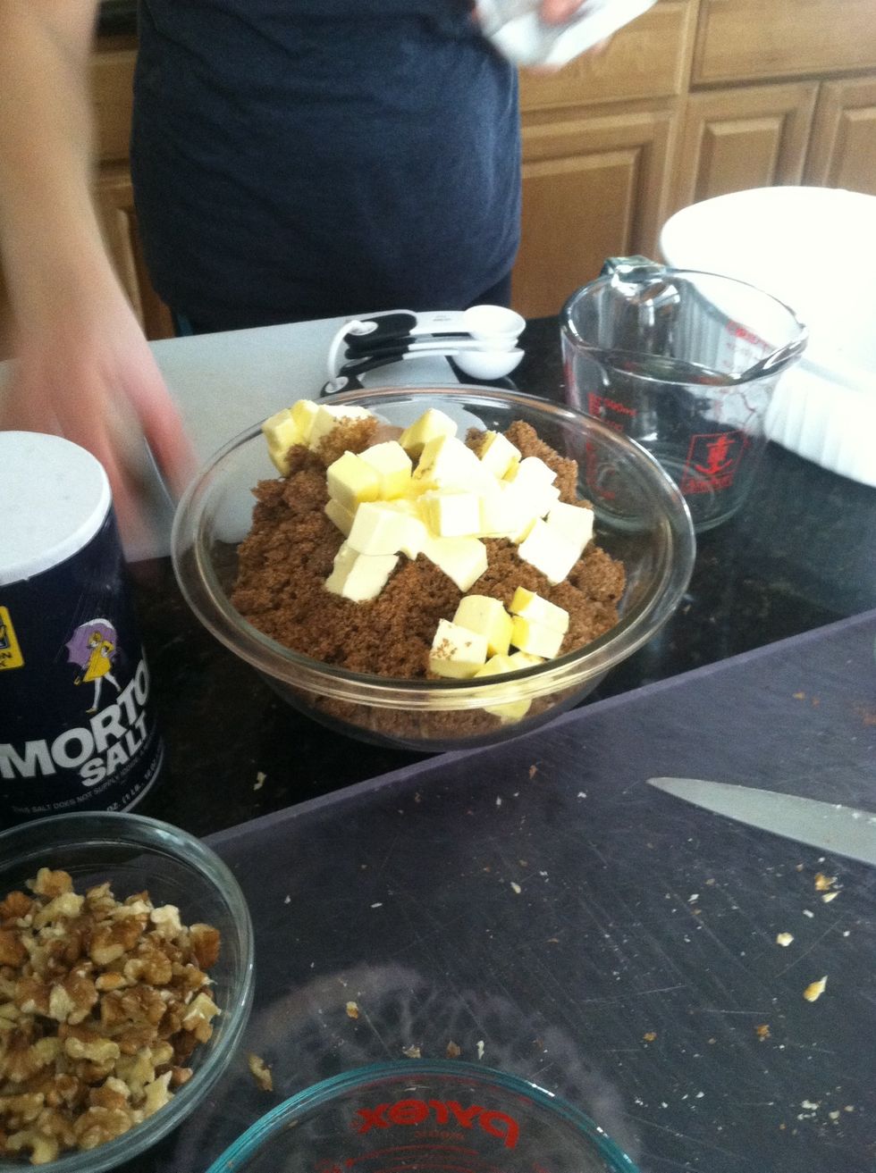 Now in a bowl add the brown sugar, butter, walnuts, ginger, cinnamon, and nutmeg