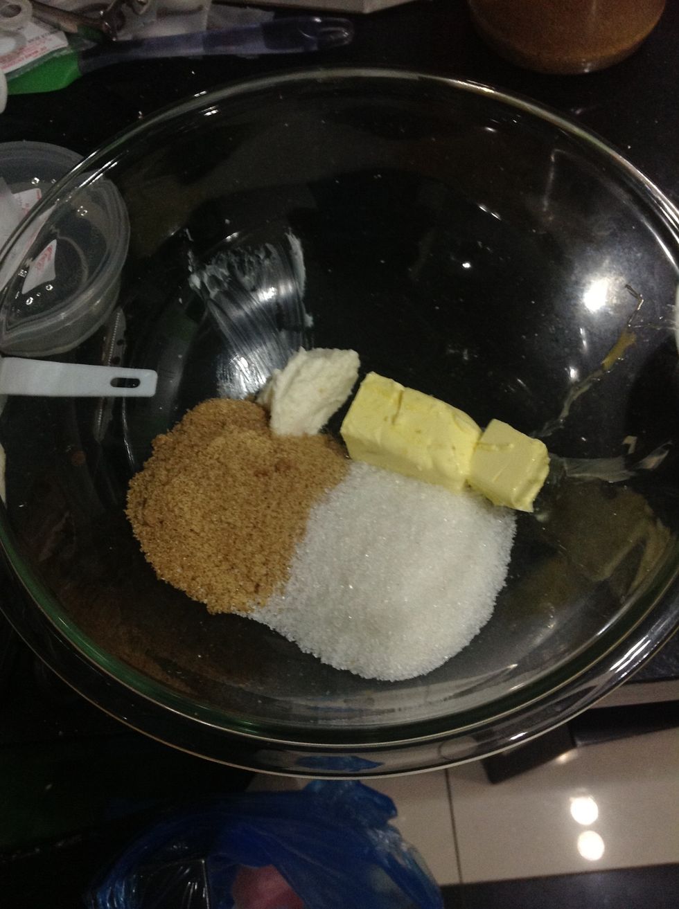 Now in a large bowl, place butter, shortening and both kinds of sugars.