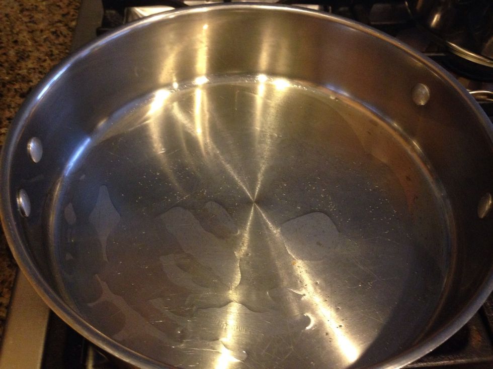 Now in a large saut\u00e9 pan or wok heat about 2-3 T of Toasted Sesame Oil on Medium Heat. If you don't have it on hand you can substitute it, but it really makes the flavors pop, so it's worth it!