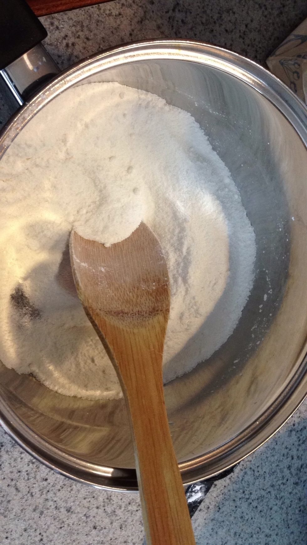 Now, in a medium sauce pan mix together 1 1/2 cups of sugar, 3 tablespoon of cornstarch , 3 tablespoon of flour. Now add 1 1/2 cups of hot water.