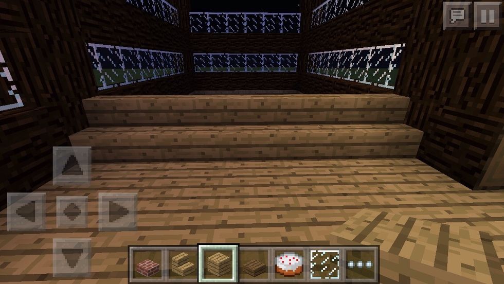 Now in the bed room you will probably notice a part of s rectangle that is not filled with wooden planks. Make a row of wooden stairs.