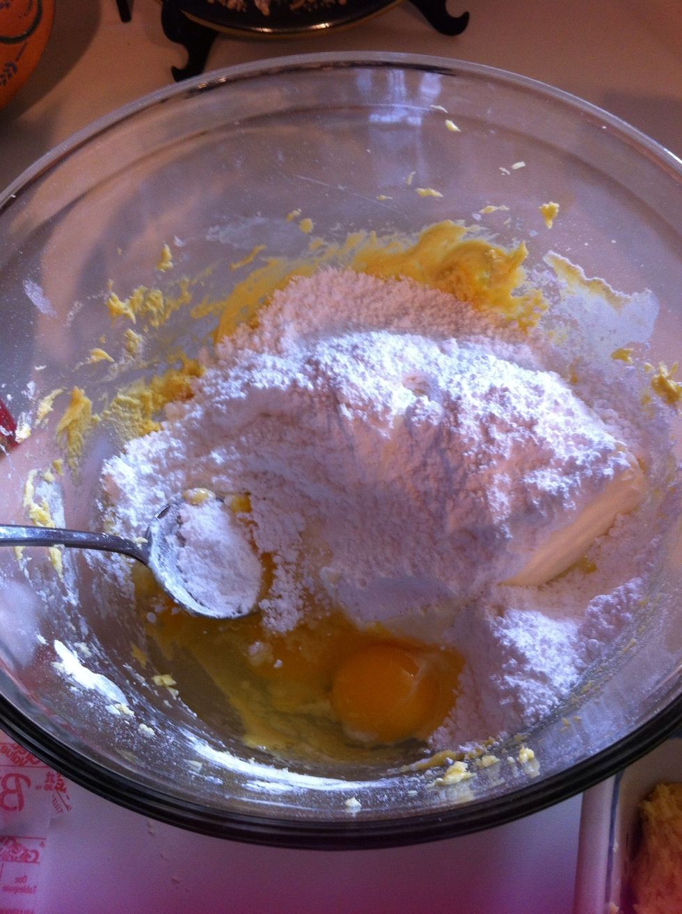 Now in the same bowl combine cream cheese, 2 eggs and 2 cups of confectioners sugar