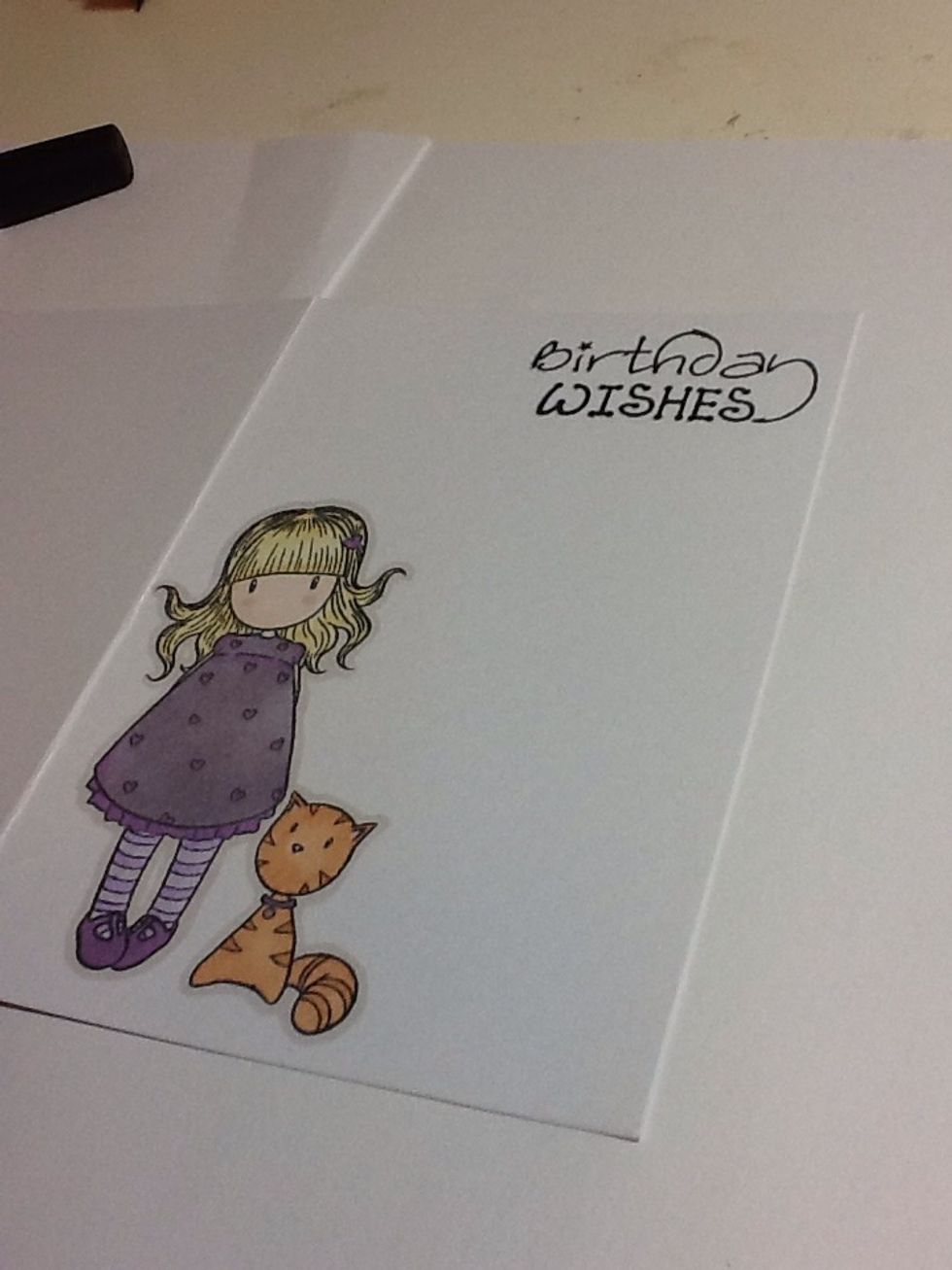 Now ink up and stamp on your greeting, I tend to go for the opposite corner to the man image