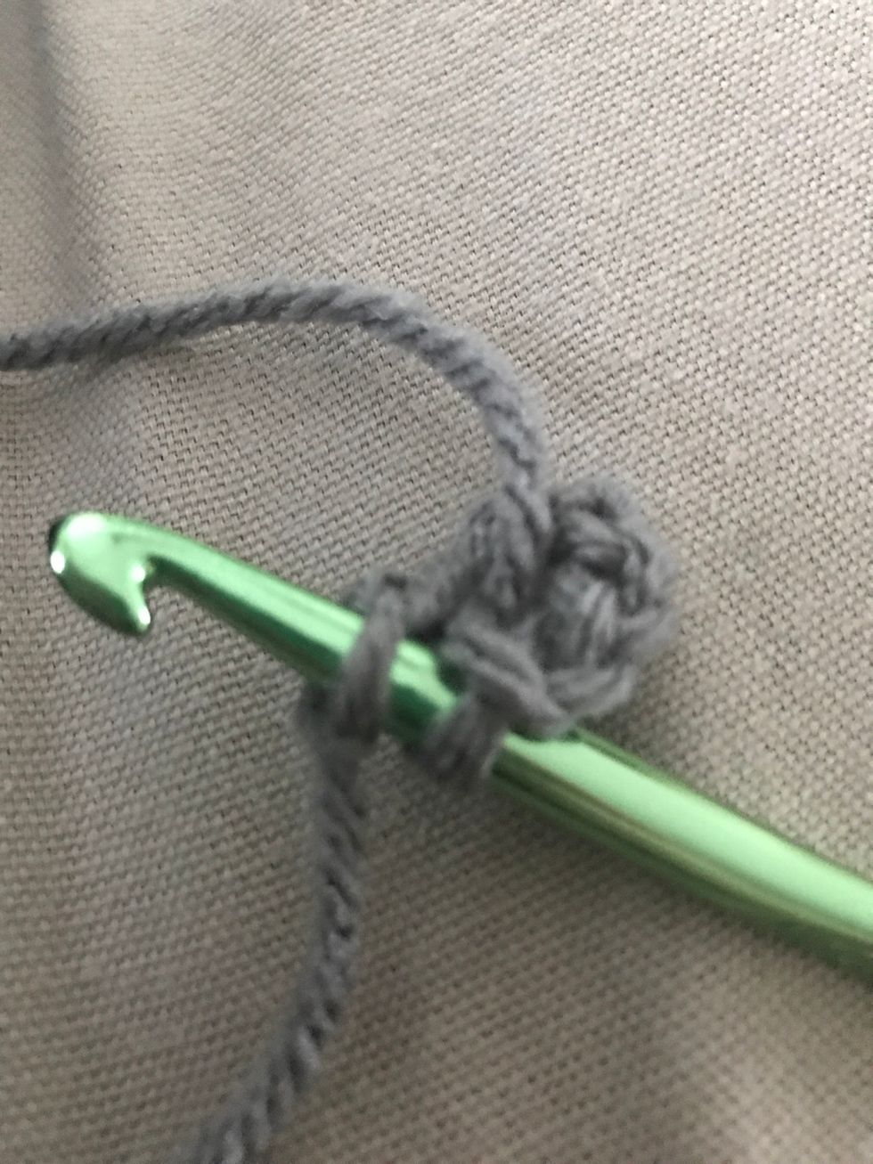 Now insert the head of your hook back to stitch 1 (slip knot)