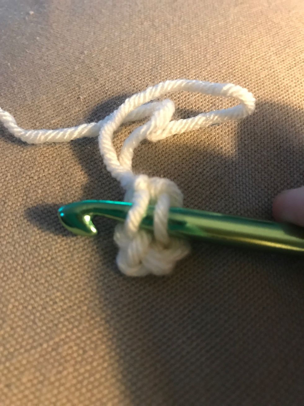Now insert your hook into stitch 4