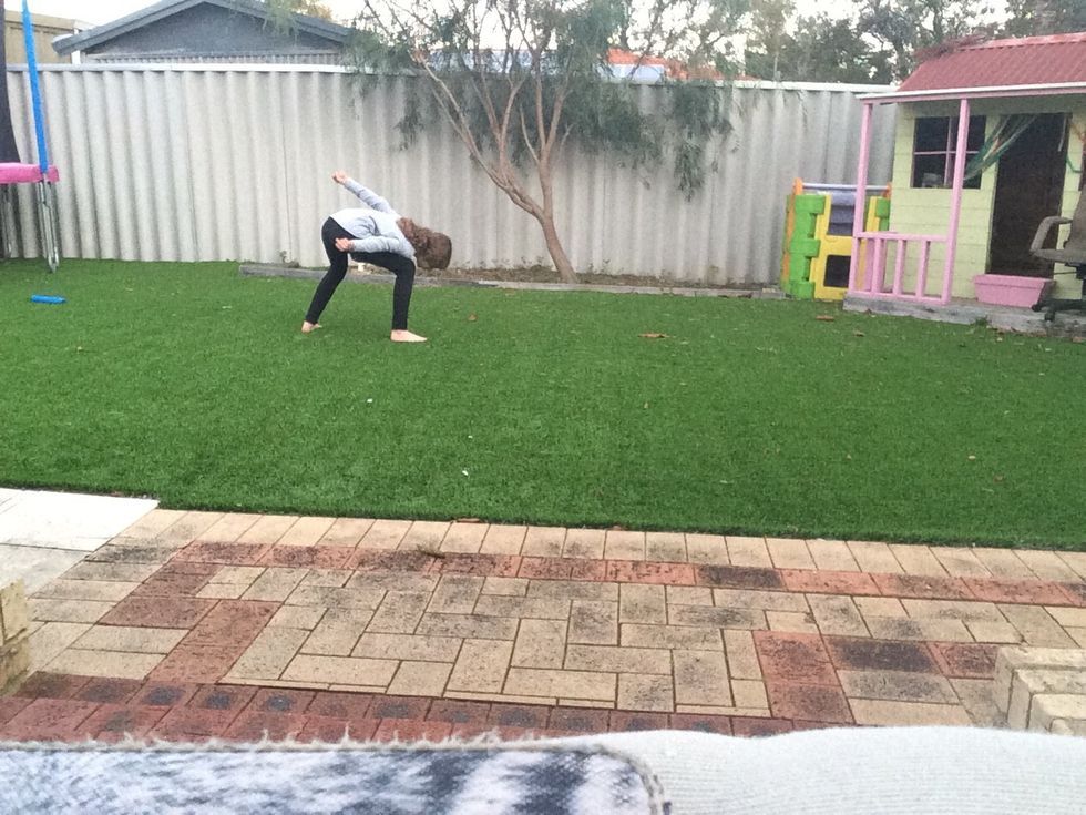 Now instead of going straight into the cartwheel, bend down so you can jump higher in the cartwheel.