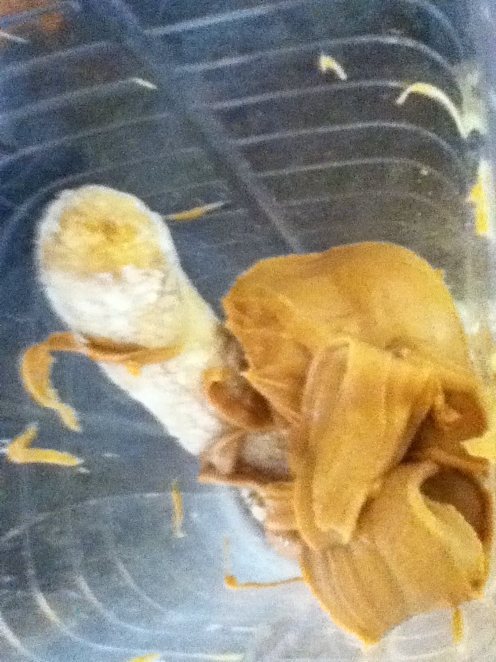 Now it gets a little messy. Add your 1/2 cup of Peanut Butter. Once again I just eye this. In my opinion the more PB the better:) This obviously makes the taste more peanut buttery.
