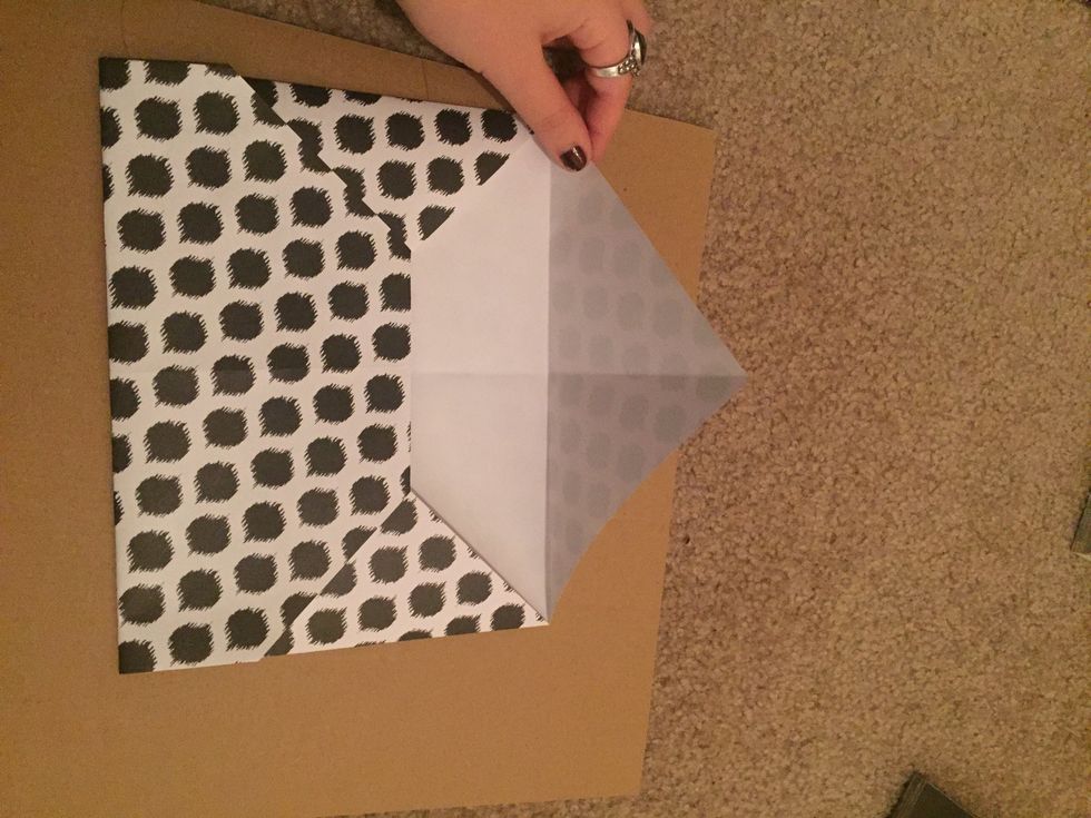 Now it is time to fold the top flap down.