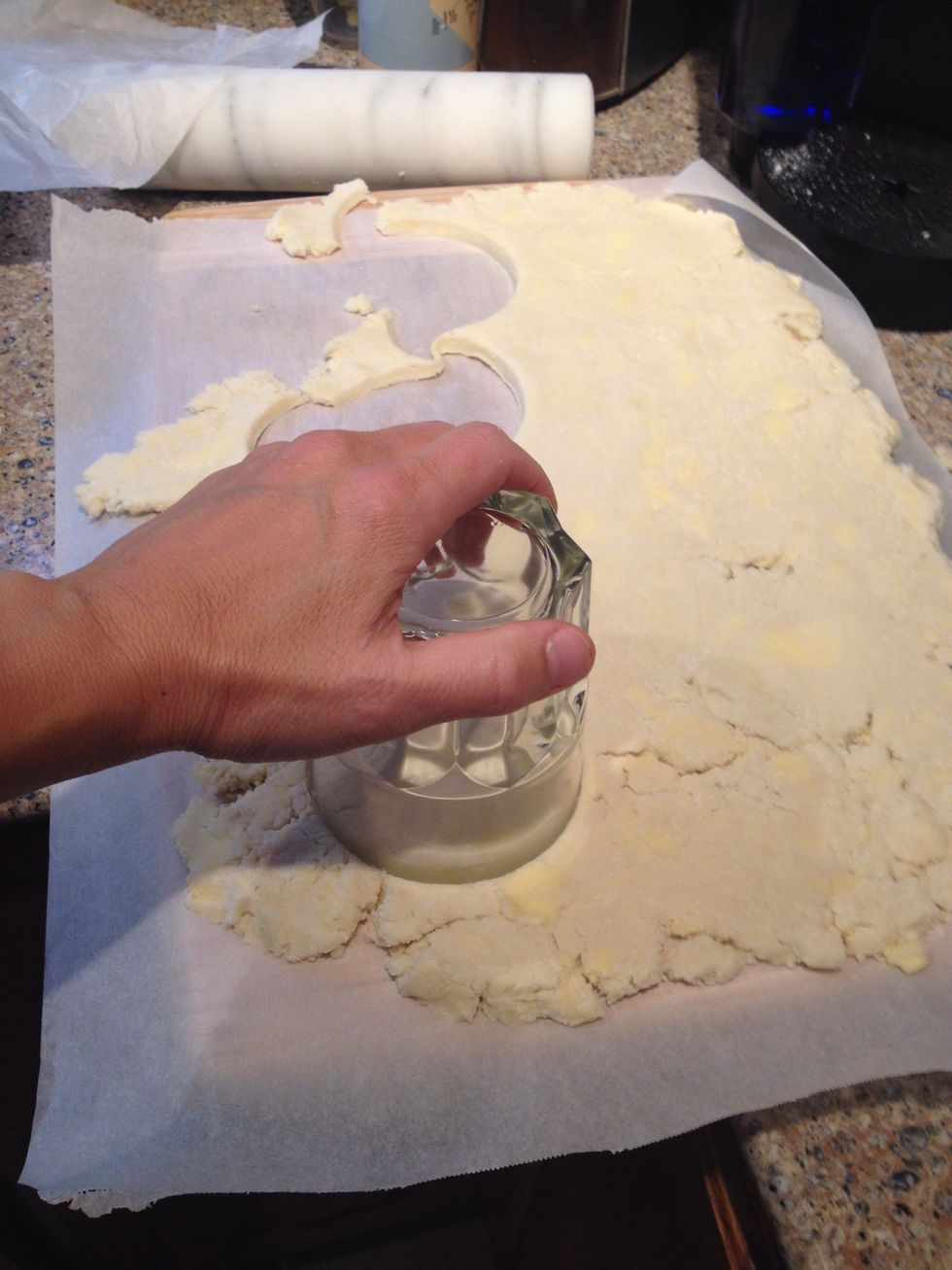 Now it is time to get the crusts cut for the individual pies. Use a glass and cut circles out of the dough.