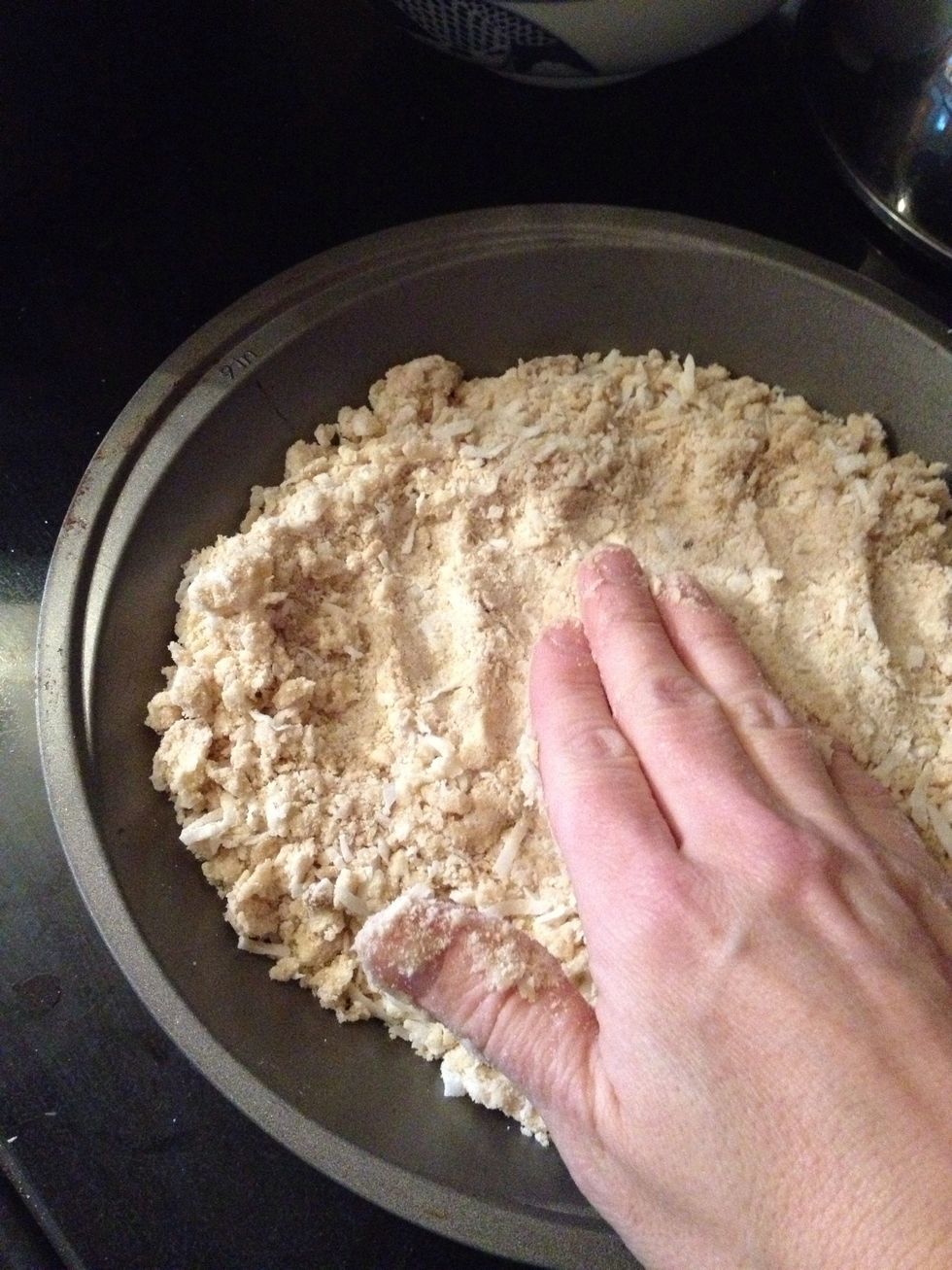 Now it needs to be pressed down into the pie pan so it's even all around.