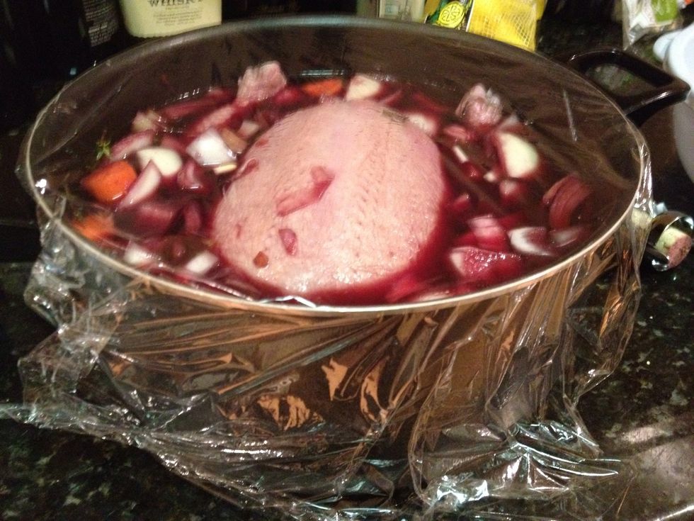 Now it's mostly covered. Cover the top with plastic wrap and put in the fridge overnight.