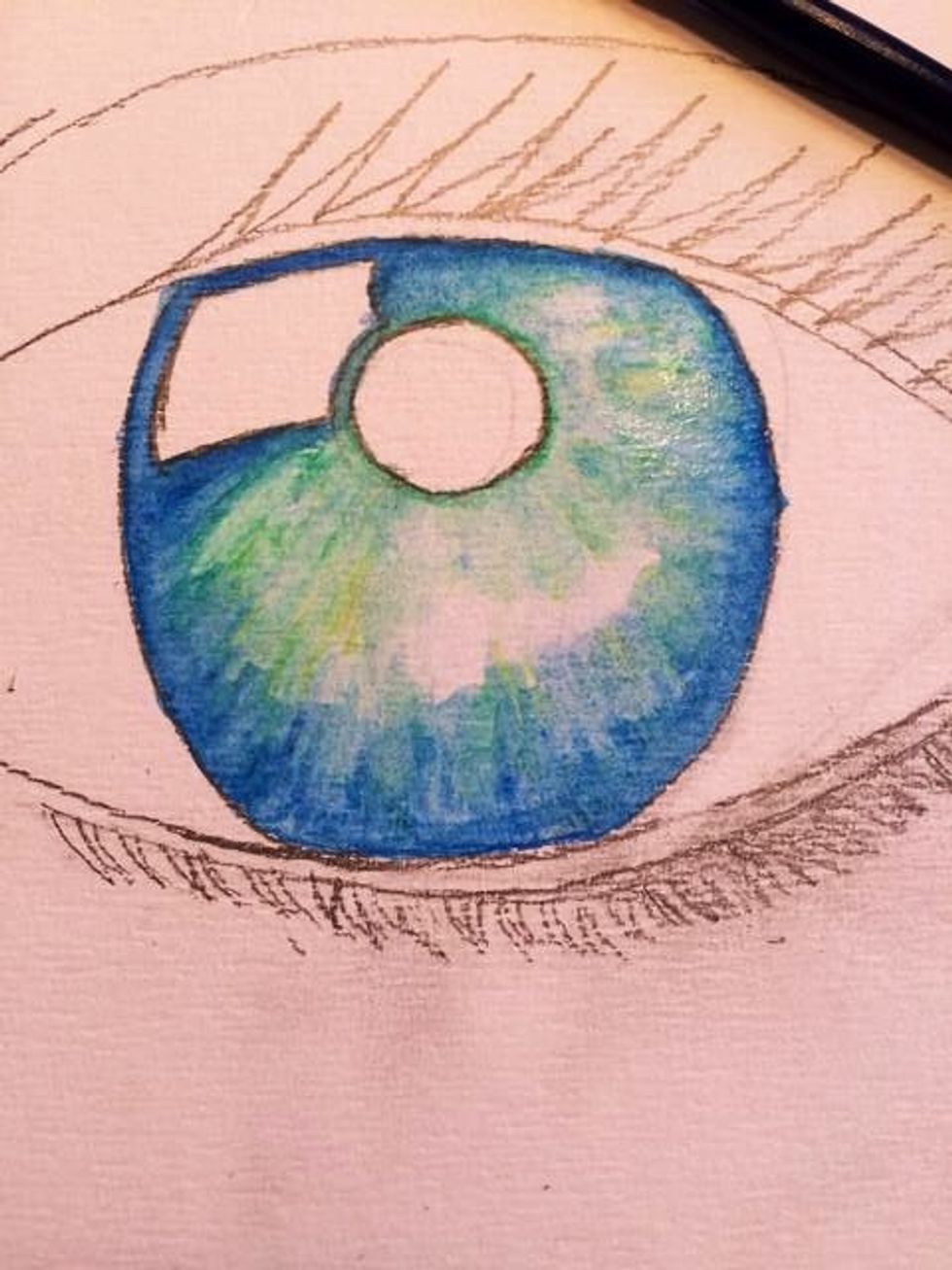 Now it's time for water! Using a small watercolor brush and starting with your lighter colors, blend your greens and blues together. Remember to clean your brush often so colors stay true.