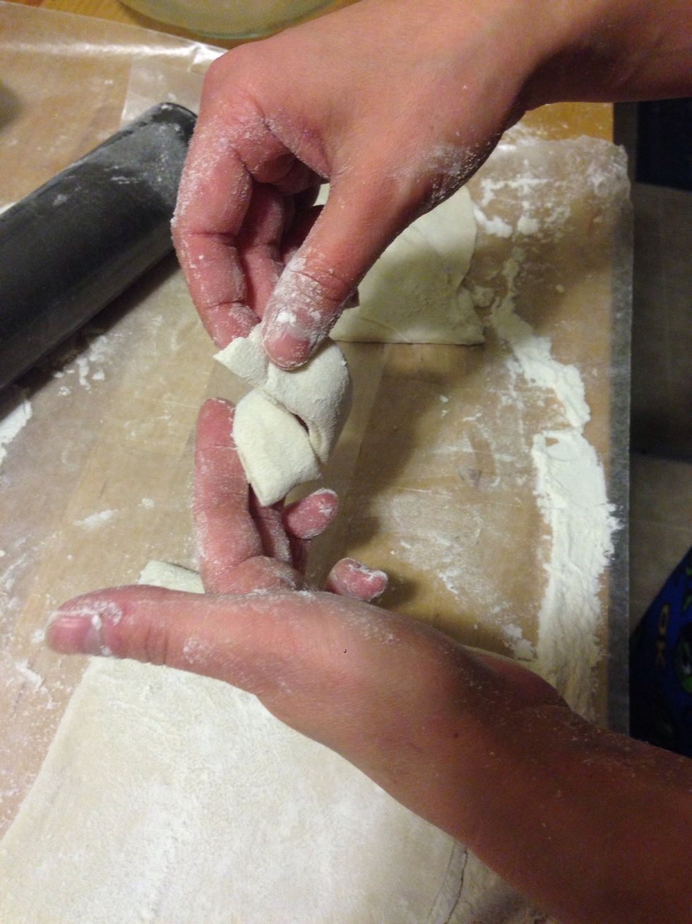 Now it's time to make the knot part. Cross one side to the other.