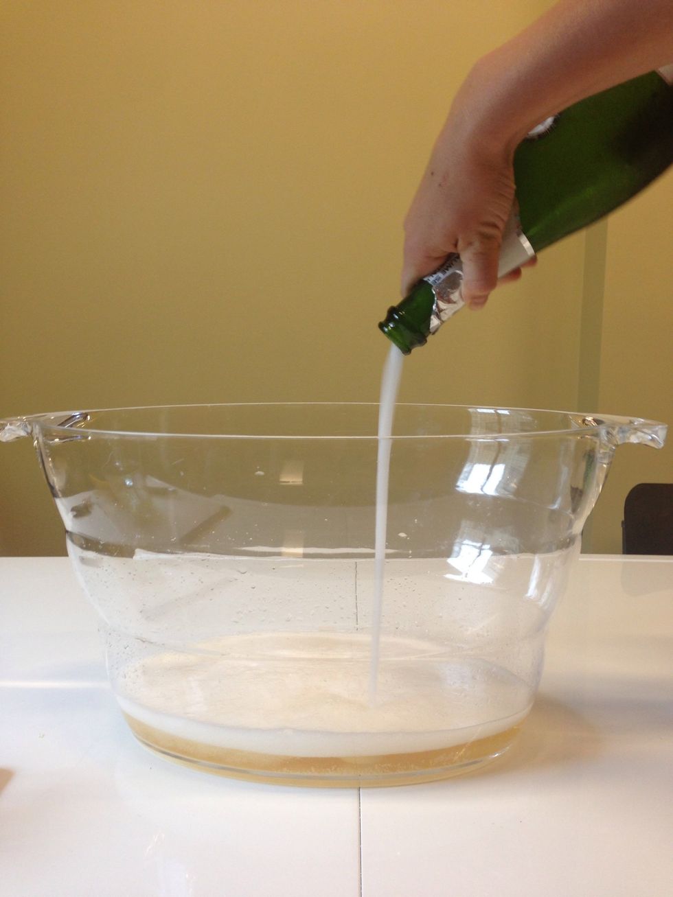 Now it's time to make the punch! First, add the sparking wine.